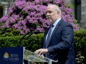 B.C. Premier John Horgan provides the latest update on the COVID-19 response in the province during a press conference from the rose garden at Legislature in Victoria, B.C., on Wednesday, June 3, 2020.