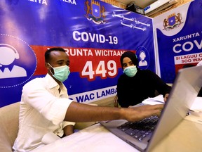 Jihan Ali Mohamud, 24, and her colleague work at the national coronavirus diseasecall centre where they supervise calls to a free hotline number as a response to the spread of the coronavirus disease (COVID-19) in Mogadishu, Somalia June 2, 2020.