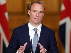 A handout image released by 10 Downing Street, shows Britain's Foreign Secretary Dominic Raab attending a remote press conference to update the nation on the COVID-19 pandemic, inside 10 Downing Street in central London on June 15, 2020.