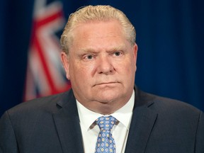 Ontario Premier Doug Ford listens to a question during the daily briefing at Queenâ€™s Park in Toronto on Thursday May 28, 2020.