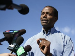 Greg Fergus, Liberal candidate for Hull-Aylmer and chair of the black caucus in Parliament, speaks to reporters during a press conference in Ottawa on Thursday, Sept. 19, 2019. A group of Black parliamentarians and their allies are calling on all levels of government to take action to reduce systemic racism in Canada.