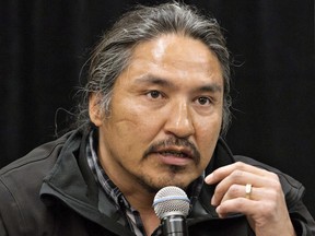 Chief Allan Adam of the Athabasca Chipewyan First Nation speaks during a press conference in Fort McMurray, Alta. on Friday May 30, 2014.