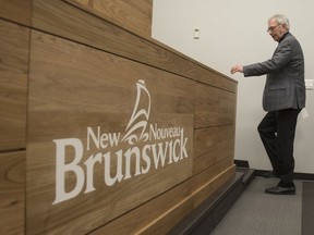 New Brunswick Premier Blaine Higgs speaks with the media in Fredericton on Monday February 17, 2020. New Brunswick public health officials are reporting the province's first death from COVID-19.