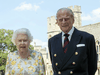 Queen Elizabeth II and Prince Philip the Duke of Edinburgh pose for a photo June 1, 2020, in the quadrangle of Windsor Castle, ahead of his 99th birthday on June 10.