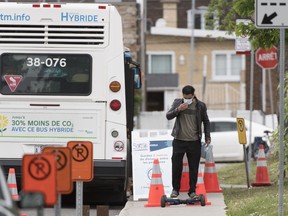 A man is shown at a mobile COVID-19 testing clinic in Montreal, Saturday, June 13, 2020, as the COVID-19 pandemic continues in Canada and around the world.