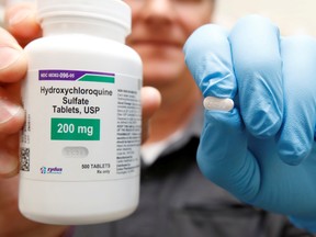 The drug hydroxychloroquine, pushed by U.S. President Donald Trump and others in recent months as a possible treatment to people infected with COVID-19, is displayed by a pharmacist at the Rock Canyon Pharmacy in Provo, Utah, U.S., May 27, 2020.