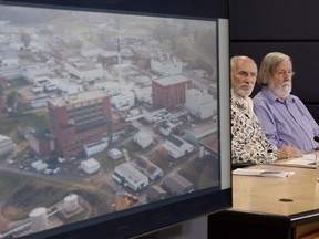 An image of the Chalk River nuclear complex is displayed during a news conference with Gilles Provost and President of the Canadian Coalition for Nuclear Responsibility Gordon Edwards in Ottawa on August 21, 2018. Several public-interest groups are calling for suspension of federal decision-making on radioactive waste disposal until Canada has a sufficient policy in place. They say the federal nuclear regulator is poised to rubber-stamp documents that will entrench weak rules for future management of nuclear waste.