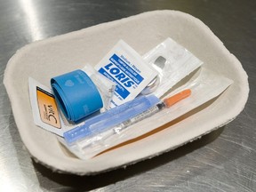 A injection kit is seen Insite in Vancouver on May 6, 2008. A harm-reduction organization planning to open Saskatchewan's first supervised drug consumption site says without provincial funding they will have to reduce their operations. AIDS Saskatoon had requested $1.3 million from the province to open their site 365 days a year 24/7 hours a day.