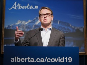 Alberta Minister of Health Tyler Shandro provides details on a new initiative intended to distribute non-medical masks to Albertans to prevent the spread of COVID-19, in Calgary, Alta., on May 29, 2020. Alberta is bringing in new legislation to regulate vaping, including a ban on anyone under 18 from using e-cigarettes. Health Minister Tyler Shandro says action needs to be taken given mounting evidence on the health risks of vaping, and statistics that show more young people in Alberta are using the devices.