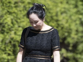 Meng Wanzhou, chief financial officer of Huawei, leaves her home to go to B.C. Supreme Court in Vancouver, Wednesday, May 27, 2020.