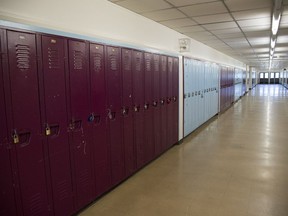 A empty hallway is pictured at Eric Hamber Secondary school in Vancouver, B.C. Monday, March 23, 2020. The Saskatchewan government says students will be returning to regular classes in the province this fall.