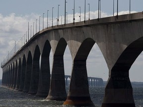 The Conferation Bridge is viewed from Borden-Carleton, P.E.I. on Friday, Sept. 27, 2013. Canada's smallest province, which once branded itself the "gentle island," is seeing some not-so-gentle attitudes emerging toward people perceived to be from other provinces, a phenomenon Prince Edward Island Premier Dennis King says is likely driven by COVID-19 fears.