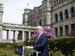 B.C. Premier John Horgan provides the latest update on the COVID-19 response in the province during a press conference from the rose garden at Legislature in Victoria, B.C., on Wednesday, June 3, 2020. It will likely be next week before British Columbia further eases restrictions in place to fight COVID-19, Premier John Horgan says.