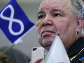 David Chartrand, president of the Manitoba Metis Federation attends a rally in Winnipeg, Saturday, Oct. 19, 2019. The Manitoba Metis Federation's president says the province has left vulnerable foster children out of pandemic response plans.