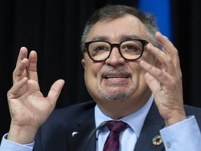 Horacio Arruda, Quebec director of National Public Health responds to reporters during a news conference on the COVID-19 pandemic, Wednesday, June 17, 2020 at the legislature in Quebec City.