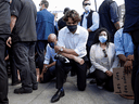 Prime Minister Justin Trudeau takes a knee during a rally against the death in Minneapolis police custody of George Floyd, on Parliament Hill in Ottawa, June 5, 2020.