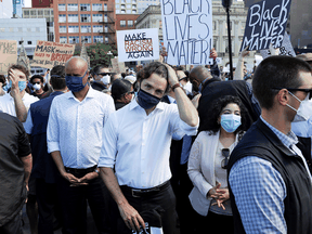 Prime Minister Justin Trudeau takes part in a rally against the death in Minneapolis police custody of George Floyd, on Parliament Hill in Ottawa, on June 5, 2020.