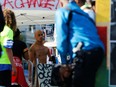 A protester holds a gun during a dispute with another armed man that resolved with no shots fired, in the Capitol Hill Occupied Protest area in Seattle on June 26.