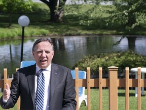 Quebec Premier Francois Legault responds to a question during a news conference in Orford, Que. on Friday, June 5, 2020.