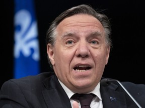 Quebec Premier Francois Legault responds to a question during a new conference in Montreal, on Monday, June 15, 2020.  Legault is scheduled to make a surprise cabinet shuffle today involving several senior ministers.THE CANADIAN PRESS/Paul Chiasson
