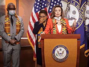 U.S. House Speaker Nancy Pelosi (D-CA) stands with members of the Congressional Black Caucus during a news conference to unveil legislation to combat police violence and racial injustice, June 8, 2020.
