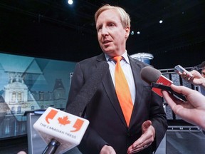 Dominic Cardy speaks to media after the New Brunswick leaders debate in Moncton on Tuesday, September 9, 2014.