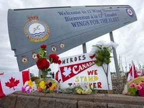 A memorial pays respect to the victims of a military helicopter crash, at 12 Wing Shearwater in Dartmouth, N.S., home of 423 Maritime Helicopter Squadron, on Friday, May 1, 2020. A motorcade procession for four of the six Canadian Armed Forces members who died in a military helicopter crash in the Mediterranean Sea in April is planned for this evening in Halifax.