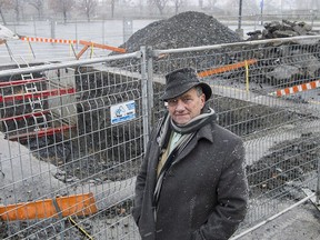 Irish Memorial Park Foundation co-founder Fergus Keyes stands next to an excavation site in Montreal, Sunday, November 19, 2017. Members of Montreal's Irish community say they aren't giving up their opposition to the decision to name a new light-rail station after a controversial former Quebec premier.