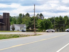 Members of the RCMP control the scene where a man was shot on Friday night, near Miramichi, N.B. on Saturday, June 13, 2020. A section of route 425 was blocked to through traffic. The man fatally shot by New Brunswick RCMP Friday night has been identified by social media posts as Rodney Levi, 48, of the Metepenagiag First Nation.