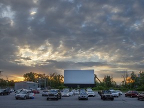 People wait for the start of the movie at the re-opening of the St-Eustache Drive-In amid the COVID-19 pandemic, Friday, June 5, 2020 in St-Eustache, Que.THE CANADIAN PRESS/Ryan Remiorz