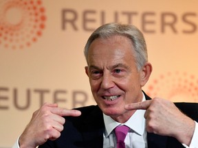 Former British Prime Minister Tony Blair speaks during an interview with Axel Threlfall at a Reuters Newsmaker event on "The challenging state of British politics" in London, Britain, November 25, 2019.