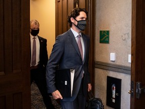 Prime Minister Justin Trudeau arrives in the foyer of the House of Commons on Parliament Hill for a meeting of the Special Committee on the COVID-19 Pandemic in Ottawa, on Wednesday, May 27, 2020.