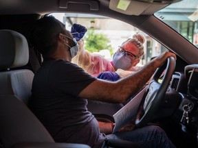 A man gets tested for coronavirus at a COVID19 testing center on July 7, 2020 in Austin, Texas.