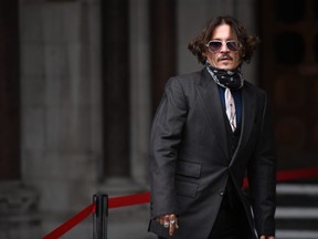 Johnny Depp arrives at The Royal Courts of Justice, Strand on July 8, 2020 in London, England.