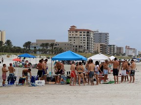 People visit Jacksonville Beach on July 04, 2020 in Jacksonville Beach, Florida.