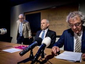 Former Ajax football club physiotherapist and Holocaust victim Salo Muller (L), chairman of a commission that proposed reparations Job Cohen (C) and president director of the Dutch national rail company NS Roger van Boxtel (R) attend a press conference to announce compensation for Jews transported to Nazi death camps during World War II, in Utrecht on June 26, 2019.