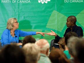 Green Party of Canada leadership candidate Annamie Pa speaks with then-party leader Elizabeth May in Sept. 2019.