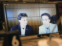 Marc, left, and Craig Kielburger appear as witnesses via videoconference during a House of Commons finance committee meeting in Ottawa on Tuesday.