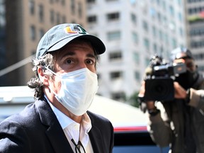 In this file photo taken on May 21, 2020 Michael Cohen, President Donald Trumps former personal attorney, arrives at his Park Avenue apartment in New York City.