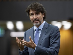 Prime Minister Justin Trudeau rises during a sitting of the Special Committee on the COVID-19 Pandemic in the House of Commons Wednesday July 22, 2020 in Ottawa.