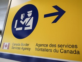 A Canada Border Services Agency (CBSA) sign is seen in Calgary, Alta., Thursday, Aug. 1, 2019.
