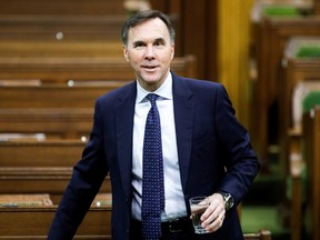 Canada's Minister of Finance Bill Morneau arrives to a meeting of the special committee on the COVID-19 pandemic, as efforts continue to help slow the spread of the coronavirus disease (COVID-19), in the House of Commons on Parliament Hill in Ottawa, Ontario, Canada May 13, 2020.