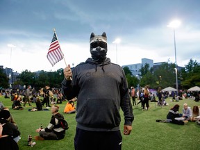 A man who wished to remain anonymous is seen in the Capitol Hill Autonomous Zone (CHAZ) (later named the Capital Hill organized Protest, CHOP) in Seattle, Wash., on June 12, 2020.