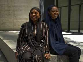 Zimman Yousuf, right, and Imaan Hyman pose in Toronto, on Monday, July 6, 2020.