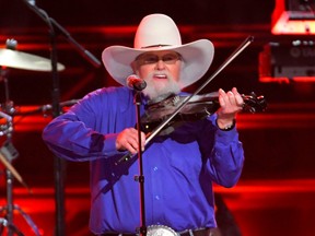 The Charlie Daniels Band performs "The Devil Went Down to Georgia" with Brad Paisley (not pictured) at the 50th Annual Country Music Association Awards in Nashville, Tennessee, U.S., November 2, 2016.