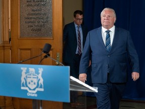 Ontario Premier Doug Ford arrives for the daily briefing at Queen’s Park in Toronto on Friday, July 3, 2020.