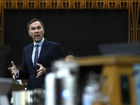 Minister of Finance Bill Morneau rises during a meeting of the Special Committee on the COVID-19 Pandemic in the House of Commons on Parliament Hill in Ottawa, on Wednesday, June 17, 2020. The federal Liberals will lay out today how they see the COVID-19 affecting federal finances for the fiscal year, detailing an estimated deficit and a projected path for the economy.