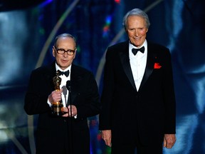 Italian film composer Ennio Morricone receives an honorary Academy Award from presenter Clint Eastwood during the 79th Annual Academy Awards at the Kodak Theatre on February 25, 2007 in Hollywood, Calif.