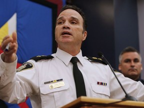 Winnipeg's police chief says there was an alarming increase in the level of brazen crime in the city as the number of homicides doubled last year. Danny Smyth, then-Winnipeg Police Superintendent, makes an announcement at a press conference in Winnipeg, Wednesday, Nov. 12, 2014.