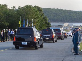 HMCS Fredericton is returning home today, nearly three months after a deadly helicopter crash that claimed the lives of six crew members. The homecoming motorcade procession for the return of Capt. Brenden MacDonald, Capt. Maxime Miron-Morin and Master Cpl. Matthew Cousins, drives through 12 Wing Shearwater near Dartmouth, N.S. on Thursday, June 25, 2020.